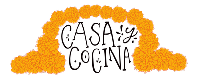Casa Y Cocina logo under a marigold arch