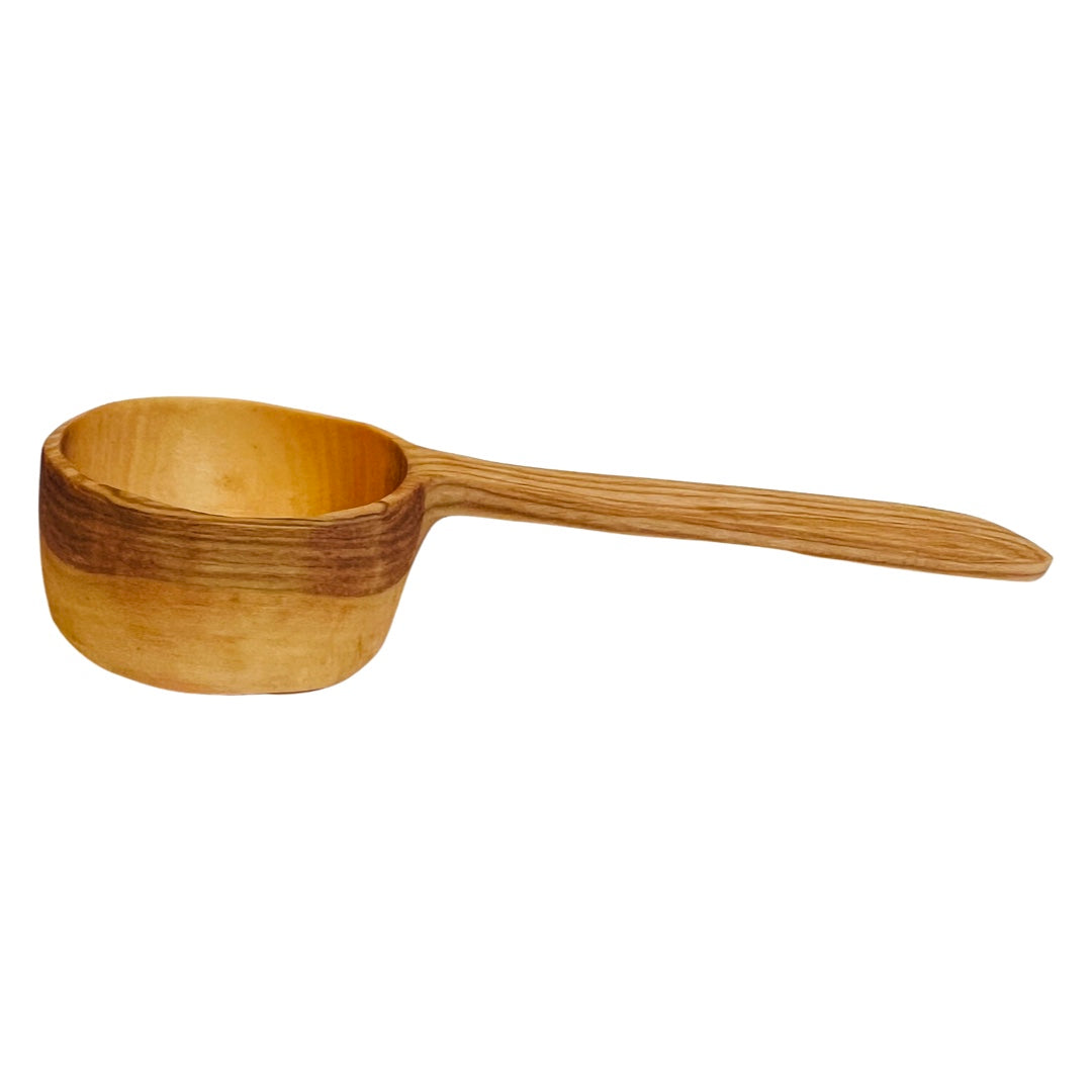 side view of a wooden scoop