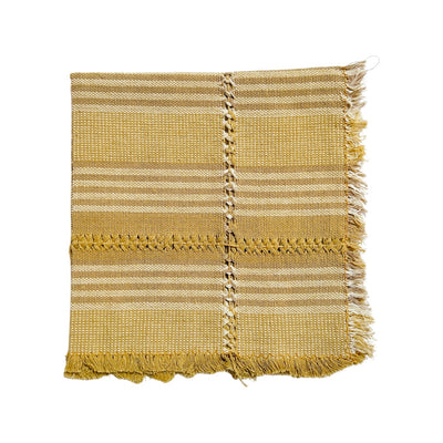 Various shades of tan striped handwoven napkin folded in quarters.