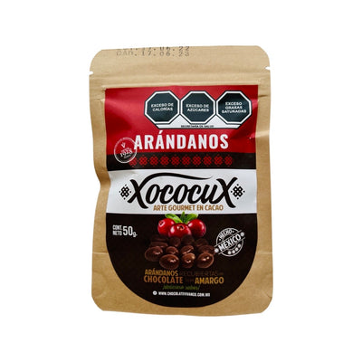 A kraft bag containing 50g of chocolate covered cranberries. The label is red, white and brown featuring a picture of cranberries and chocolate covered cranberries. 