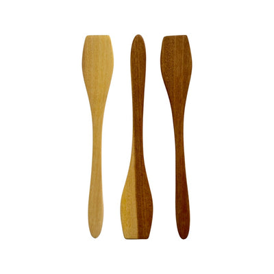 Three small condiment wooden spatulas.