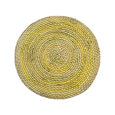 Natural colored circular woven palm placemat