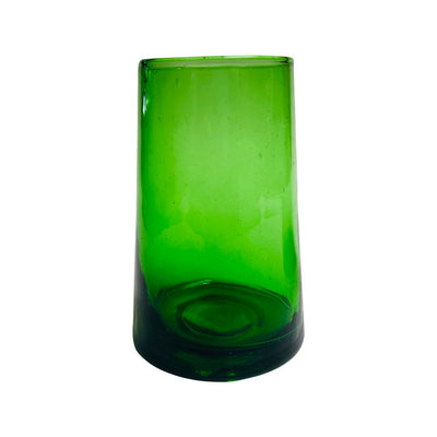 front view of translucent green colored drinking glass