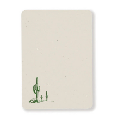 Notecard features cactus illustration in lower left corner