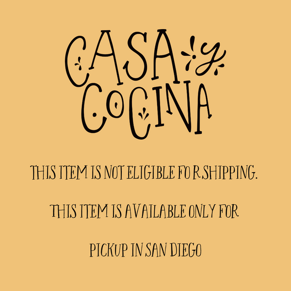 Sand colored square with the phrase Casa y Cocina. This item is not eligible for shipping. This items is available only for pickup in San Diego.
