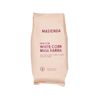 front view of a single bag of heirloom white corn masa harina in branded packaging.