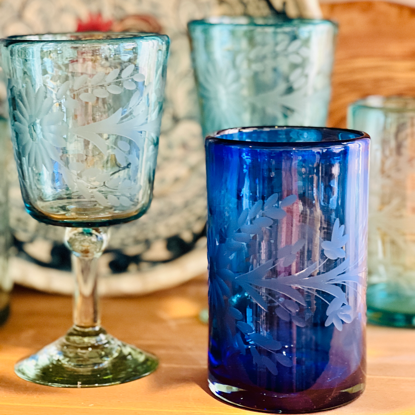 Collection photo for our "Drinkware" collection. Image showcases a few different styles of glasses & tumblers
