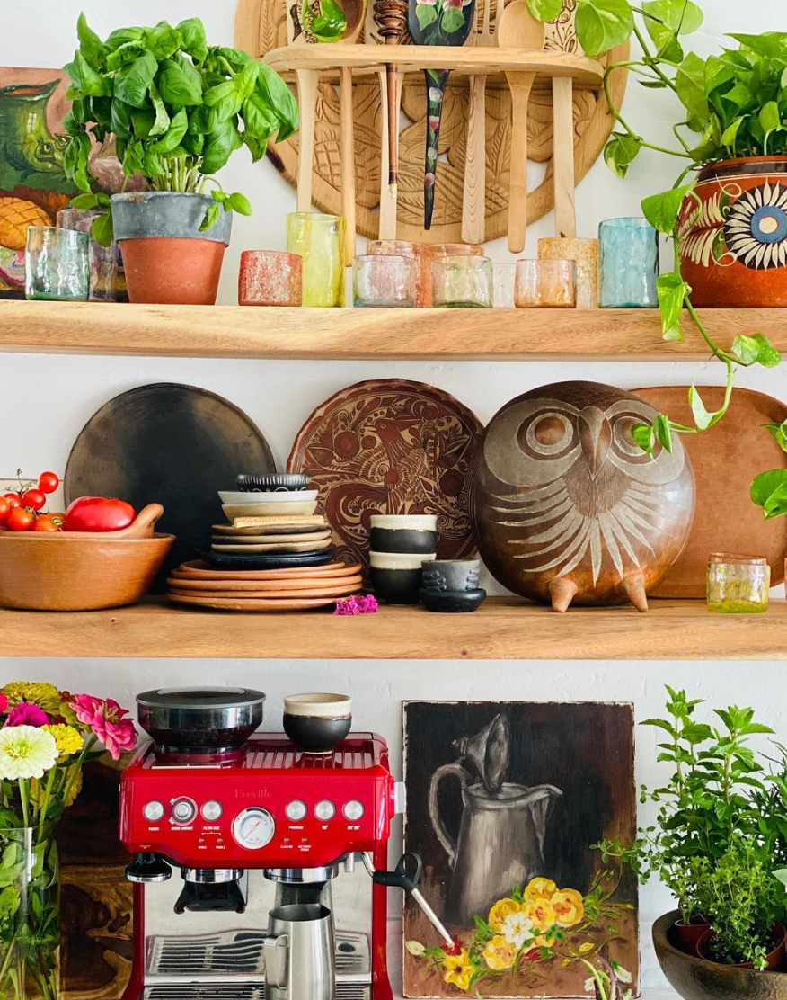 Collection photo for our "Customer Favorites" collection. Image showcases a kitchen wall with shelves of miscellaneous kitchen items and plants