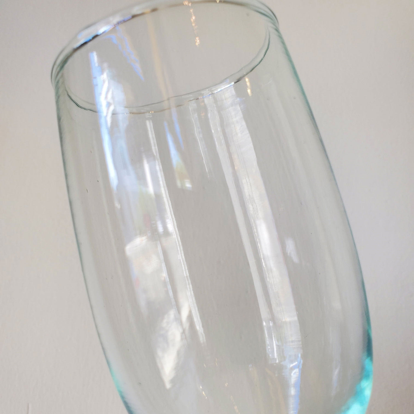 Collection photo for our "Shop By Color: Clear" collection. Image is a clear champagne glass