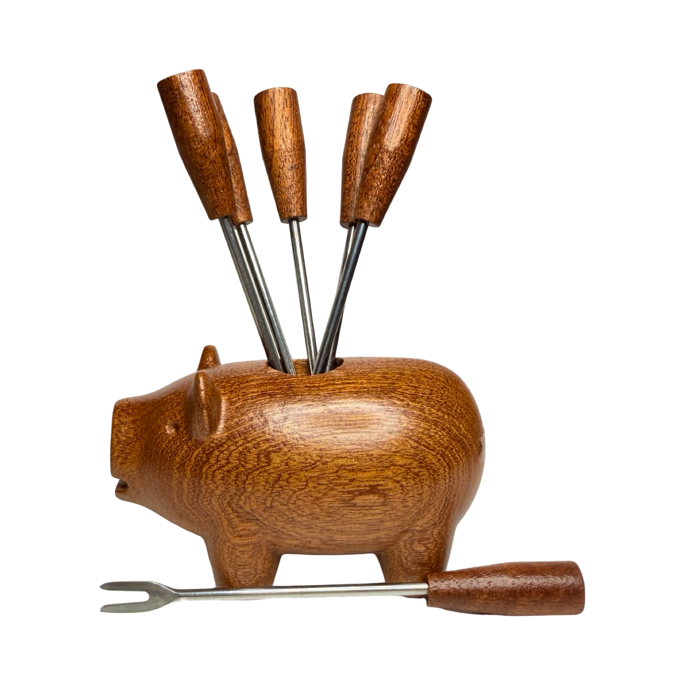 Wooden pig-shaped holder with six stainless steel appetizer picks featuring wooden handles.