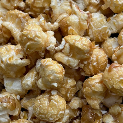 close up of popcorn with caramel coating.