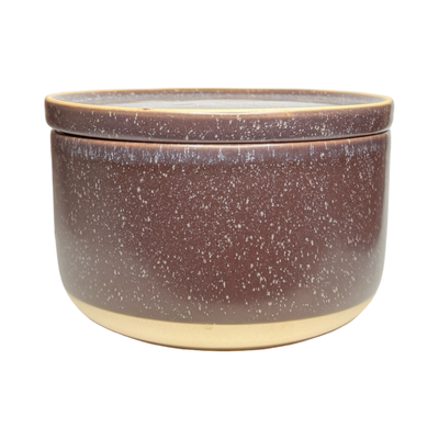 dark purple stoneware bowl with a speckled glaze and matching plate used as a lid, featuring a clean, modern design.