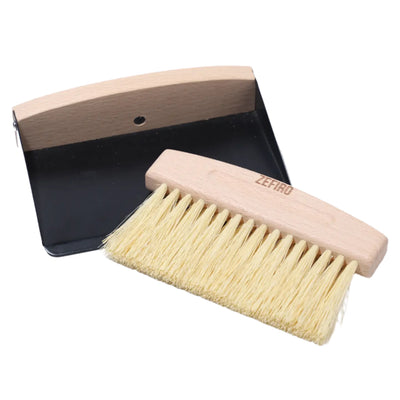 Compact mini sweep set featuring a beech wood-handled brush with natural fiber bristles and a black metal dustpan