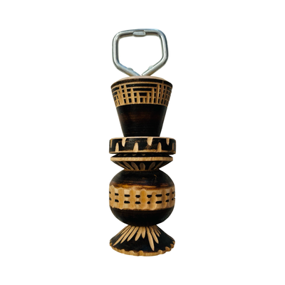 Hand-carved wooden molinillo-style bottle opener with metal heads.