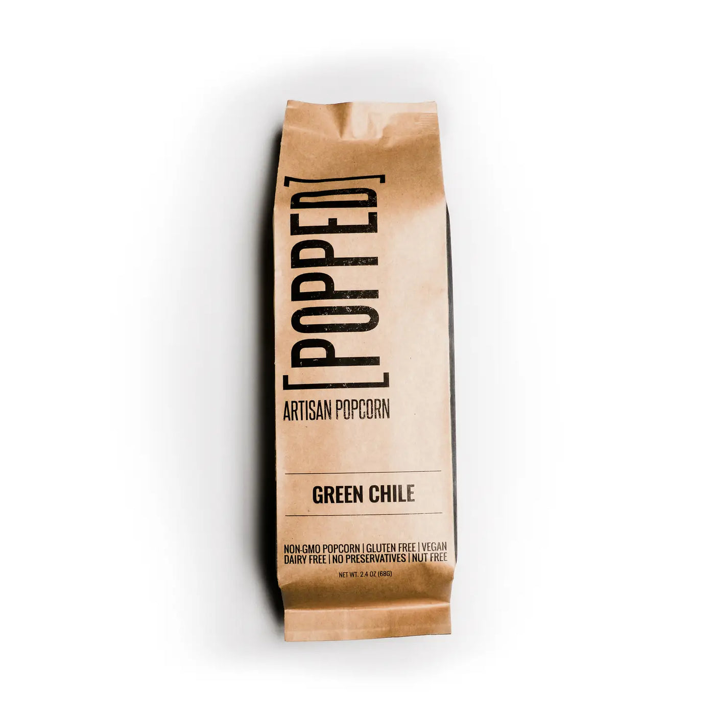 brown bag of green chile flavored artisan popcorn. label in black lettering.