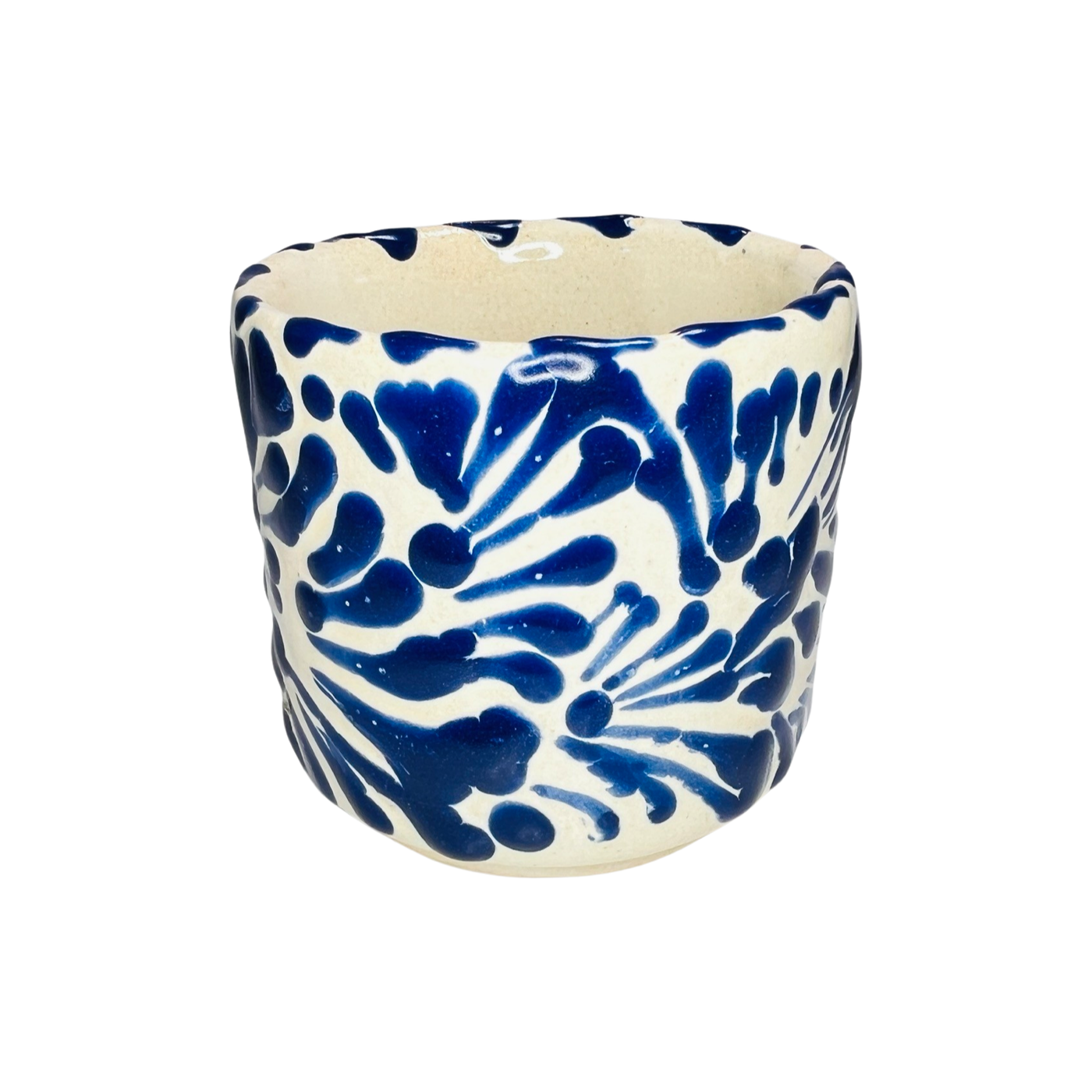 white and blue talavera designed cup