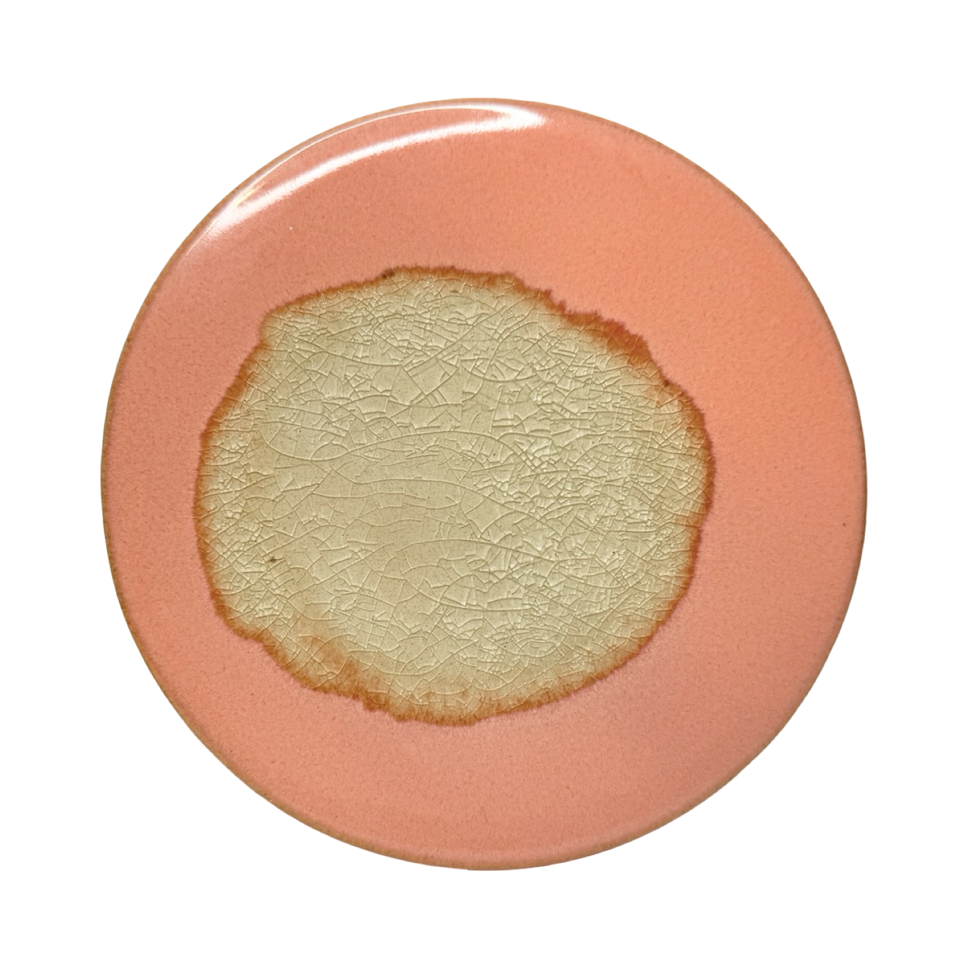 coral round stoneware trivet with two-tone reactive glaze, showing slight variations in finish.