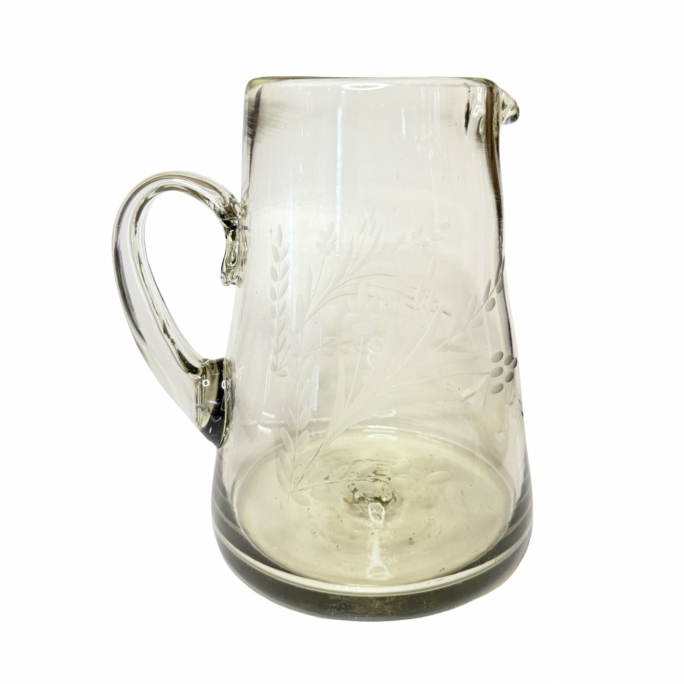 Clear glass pitcher with floral etching