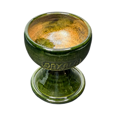 top view of a Green ceramic copa with pedestal base and “Oaxaca” stamped on the bowl.