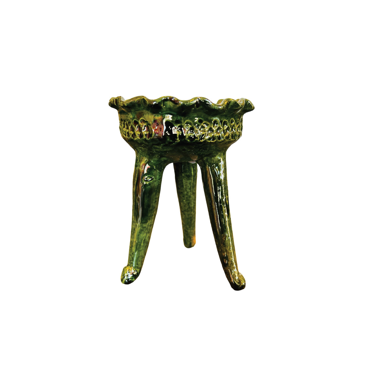 Green ceramic copalero featuring a stamped design.