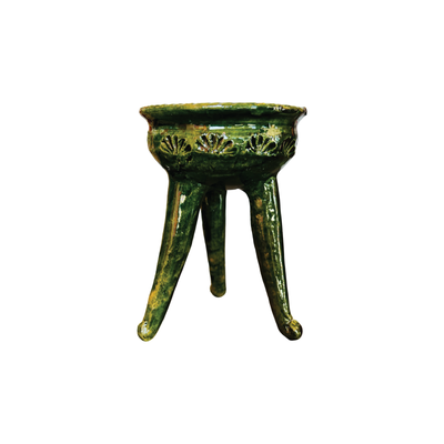 Green ceramic copalero featuring a stamped design.