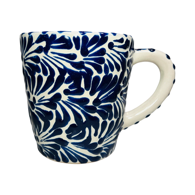 white and blue talavera designed mug