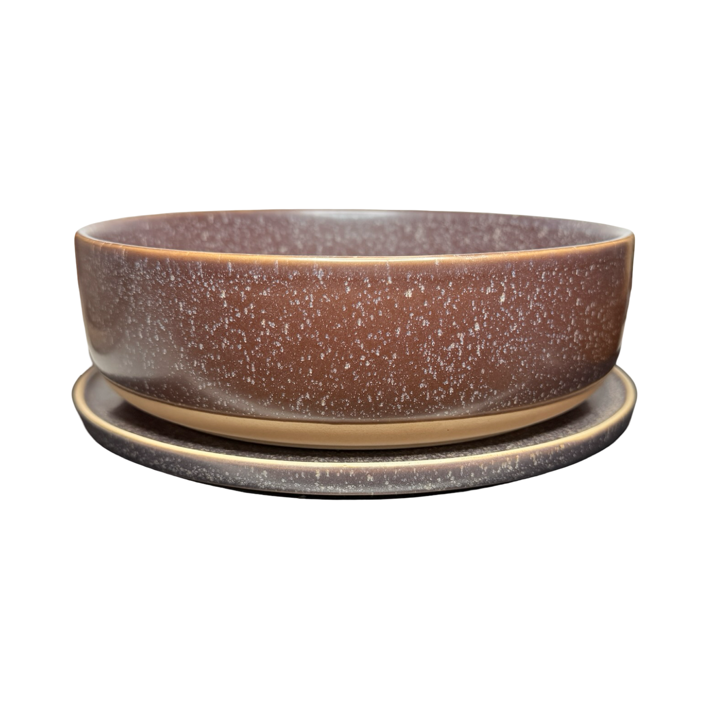 Plum Purple stoneware bowl with a speckled glaze, stacked on a matching plate with a smooth, matte finish