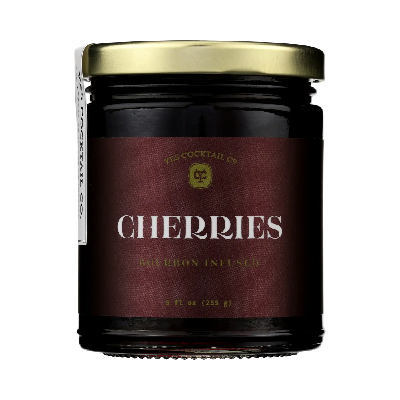 9 fl oz Dark glass jar with gold lid labeled “Yes Cocktail Co. Cherries — Bourbon Infused.