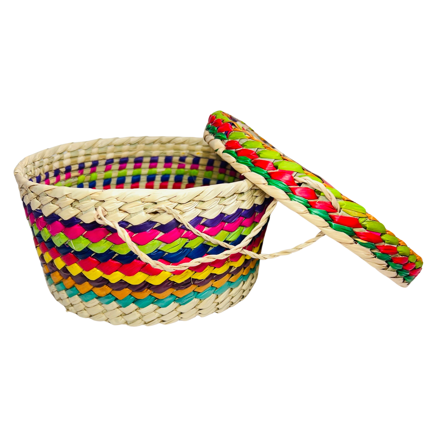 side view of a colorful Mexican woven palm tortillero with the lid open and on the side of the basket