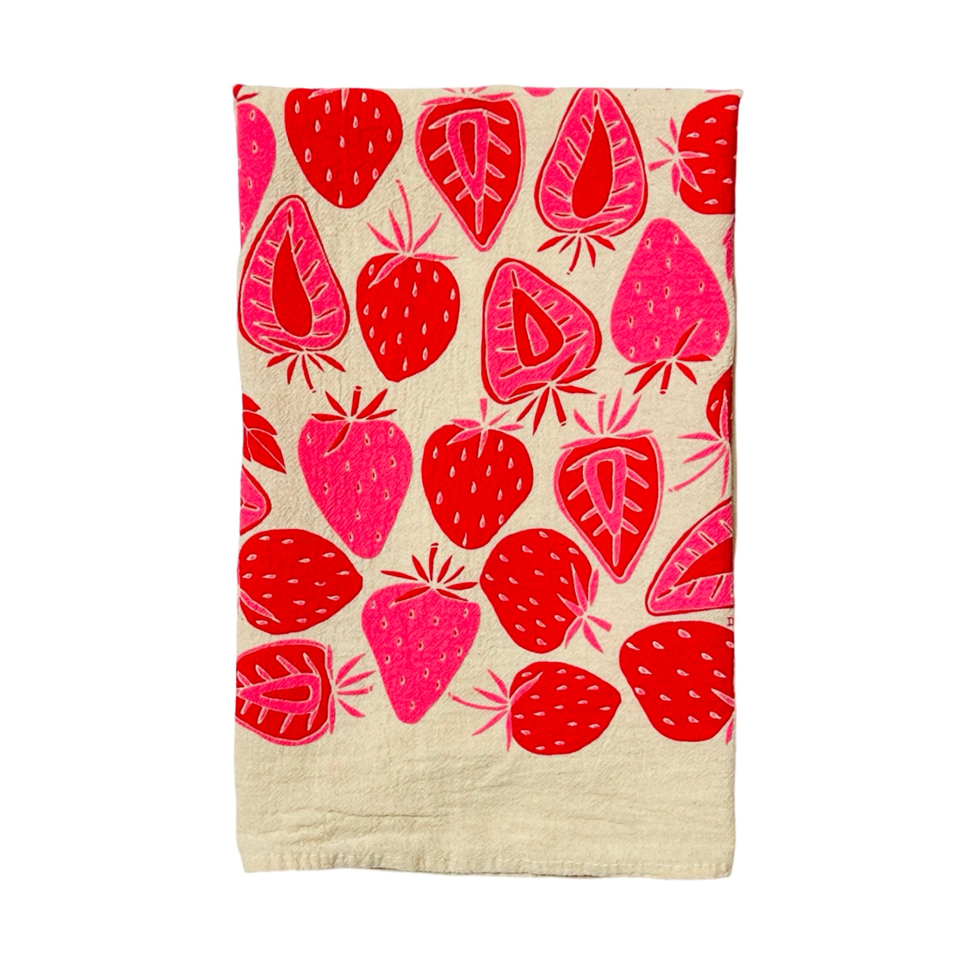 natural flour sack towel folded in quarters with a red and pink strawberry pattern design