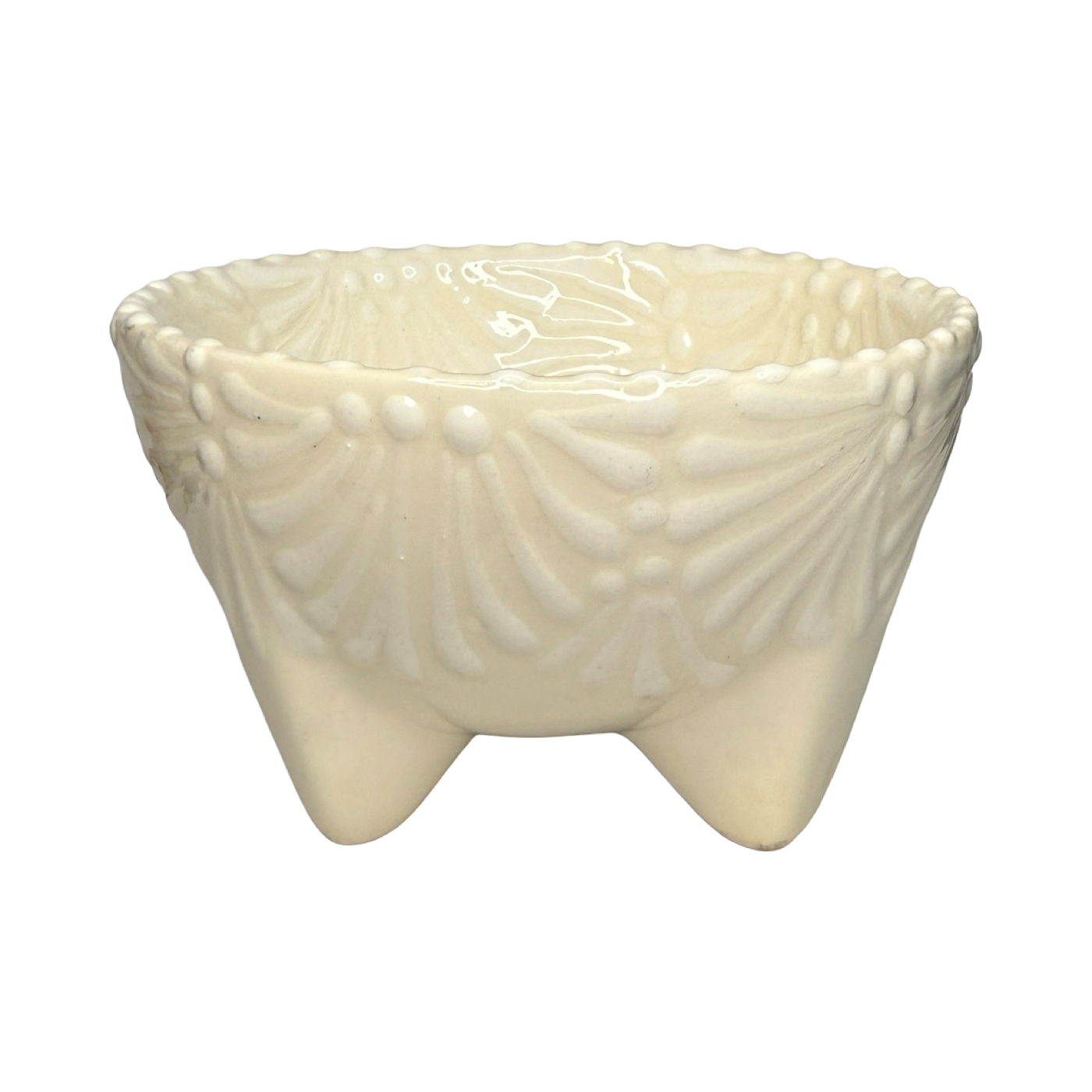 Handcrafted ceramic molcajete-style bowl with a white floral design on a cream background and three short legs.