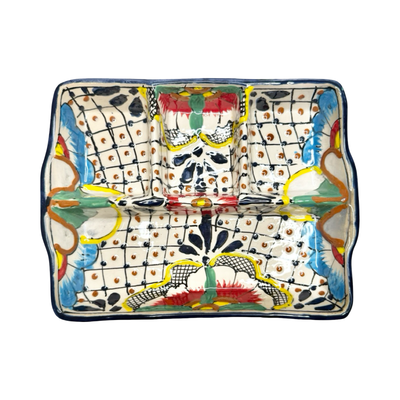 Rectangular ceramic divided platter with three sections, hand-painted with colorful flowers, leaves, and dotted patterns.