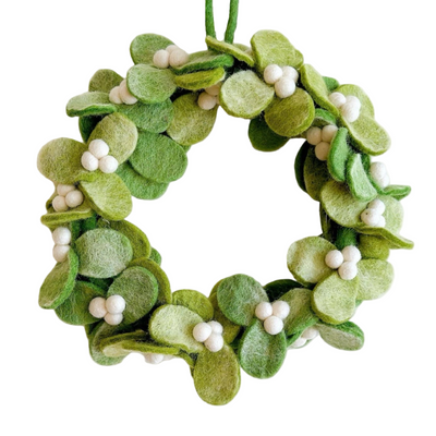 Green wreath with white berries