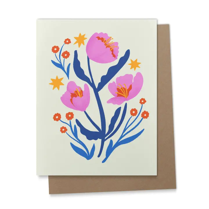 Greeting card with vibrant pink flowers, orange accents, golden stars, and deep blue leaves with a kraft envelope