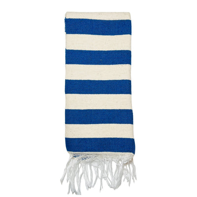 blue and cream striped towel with a fringe folded in quarters