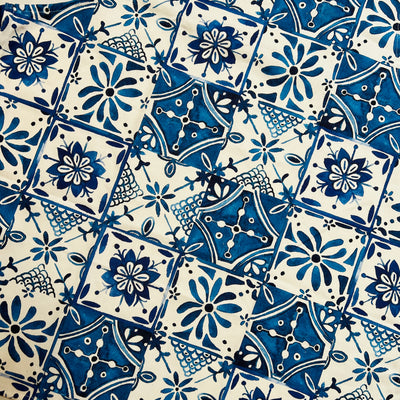 close up view of a Apron featuring a blue Mexican tile design 