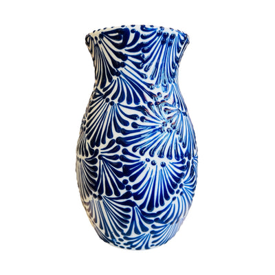 ceramic vase with a blue and white Puebla design