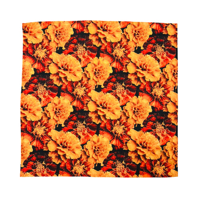 square kitchen towel featuring a realistic marigold image