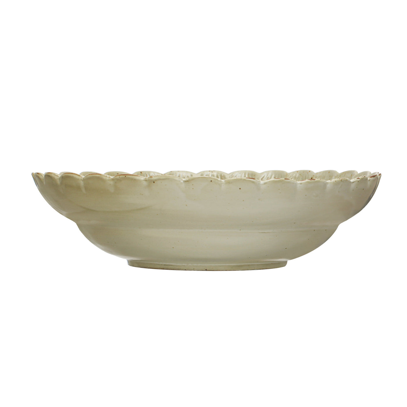 Side view of a green stoneware bowl with scalloped edges and a smooth glazed finish.