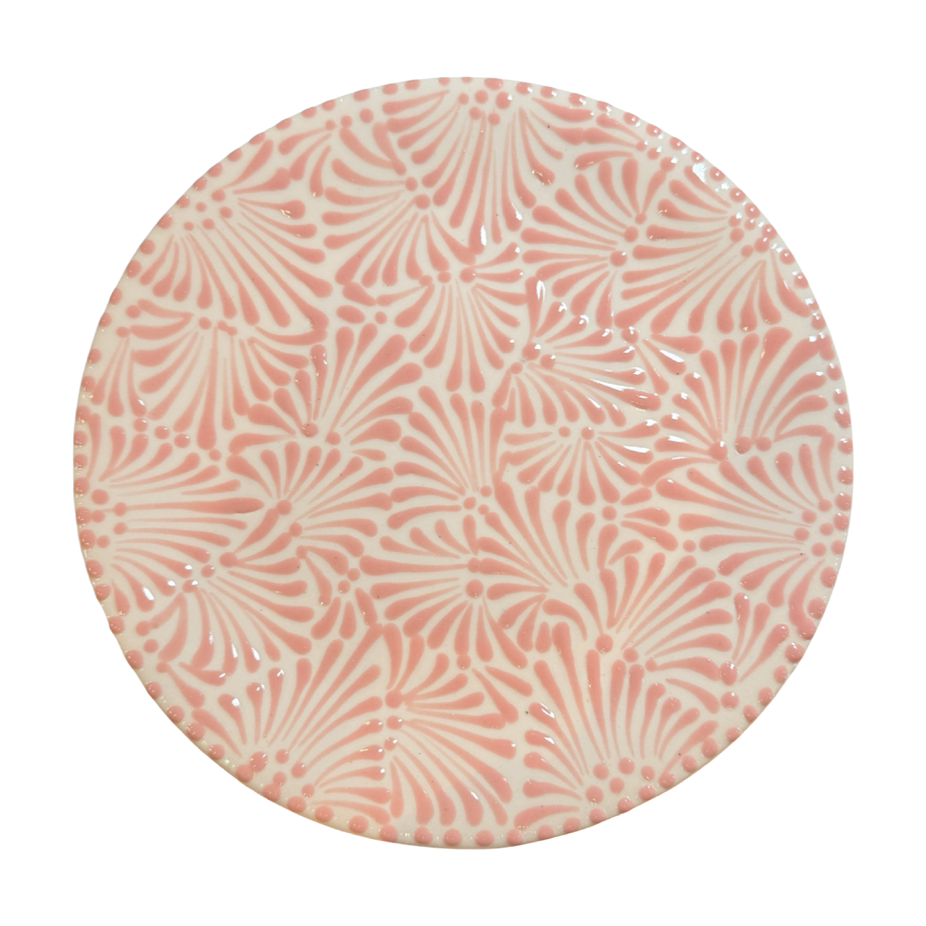 Top view of white round plate with pink signature talavera glazed design.