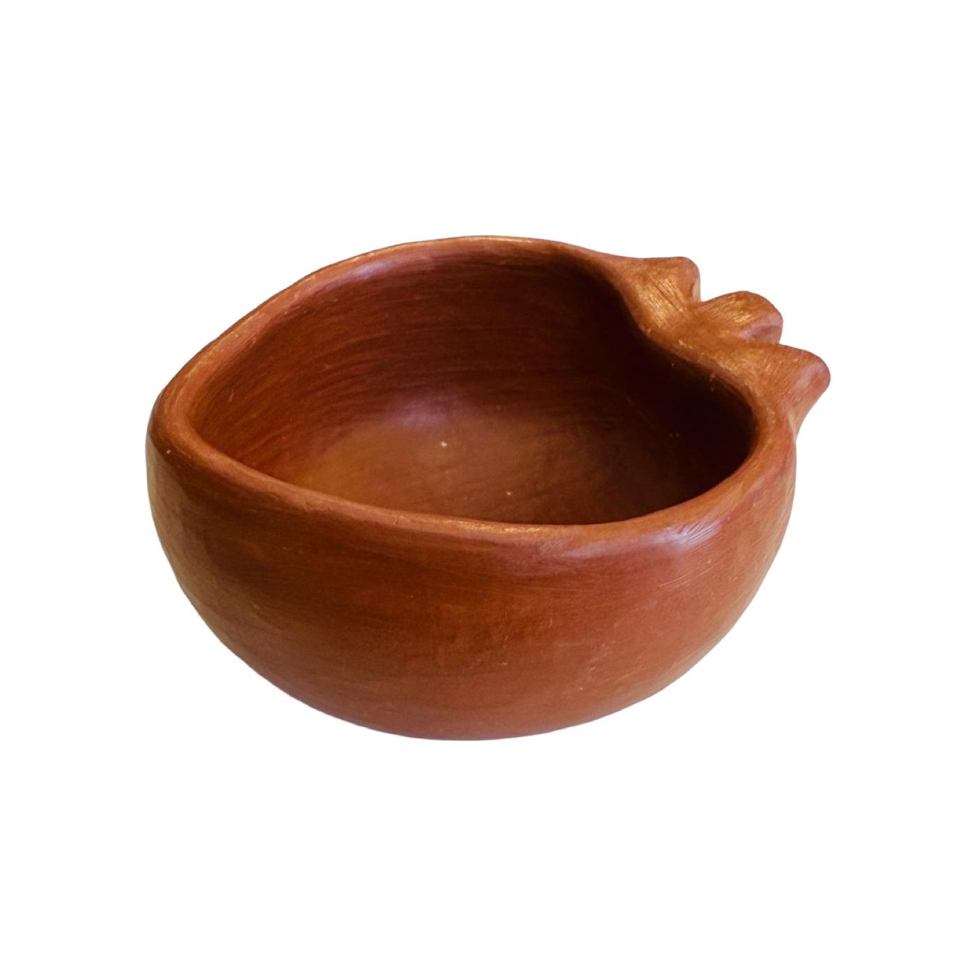 side view of a heart shaped red clay mezcalero