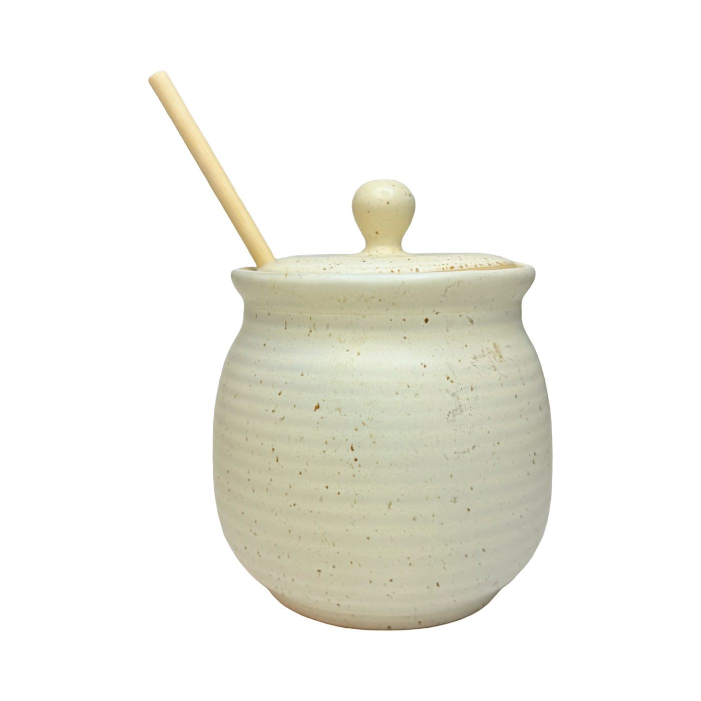 Speckled stoneware honey jar with matching lid and wooden honey dipper.