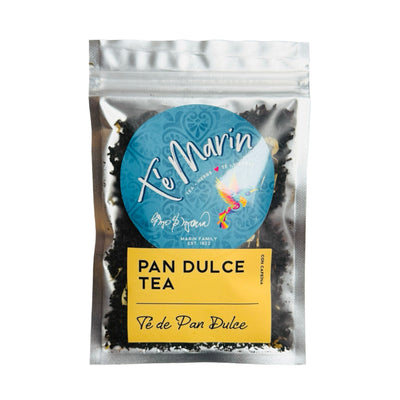 A clear resealable bag of loose leaf tea labeled “Te Marin.” The packaging features a blue circular logo with a colorful hummingbird and a yellow label that reads “Pan Dulce Tea.”