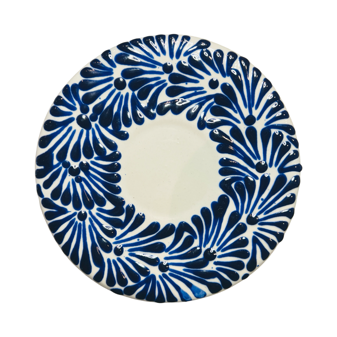 Top view of a blue and white Puebla talavera round plate