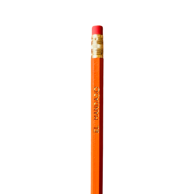 orange pencil with the phrase EL MANDADO in gold foil lettering.