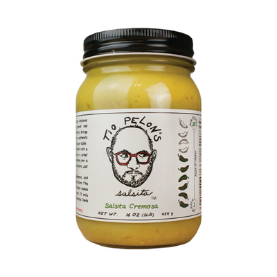 16 oz clear jar of salsita cremosa with a black and white branded label featuring an illustration of a bald man wearing glasses.