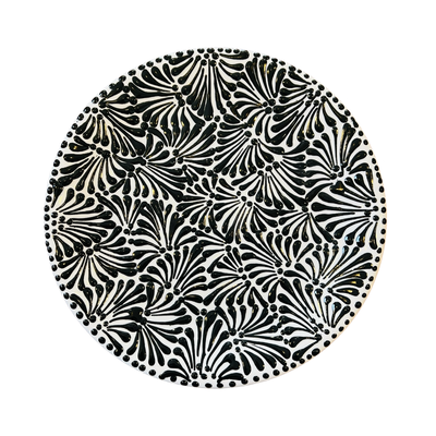 Round plate with the Puebla signature black and white glazed design