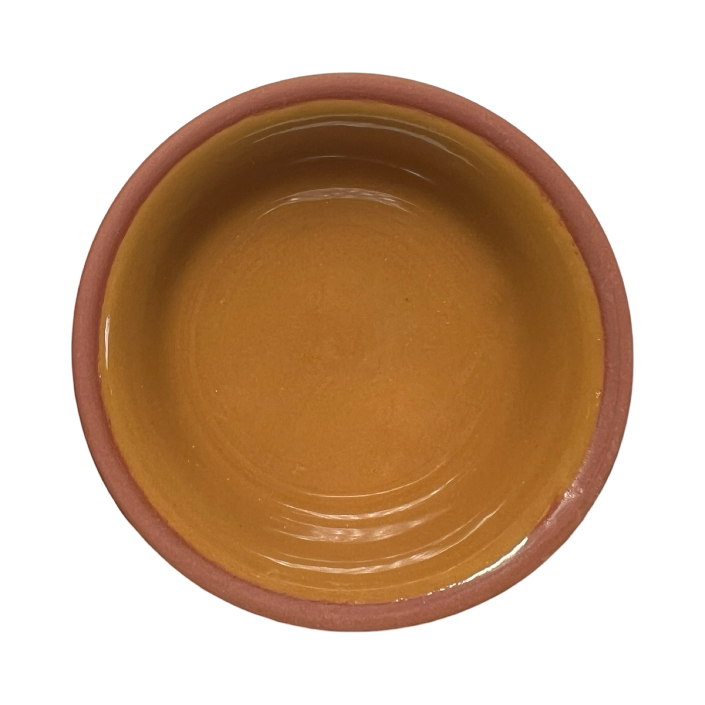 terracotta pinch bowls with an unglazed exterior and glazed interiors in mustard yellow