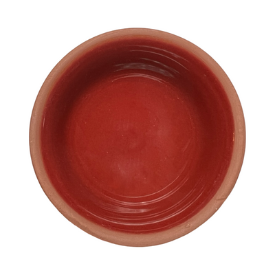 terracotta pinch bowls with an unglazed exterior and glazed interiors in  red