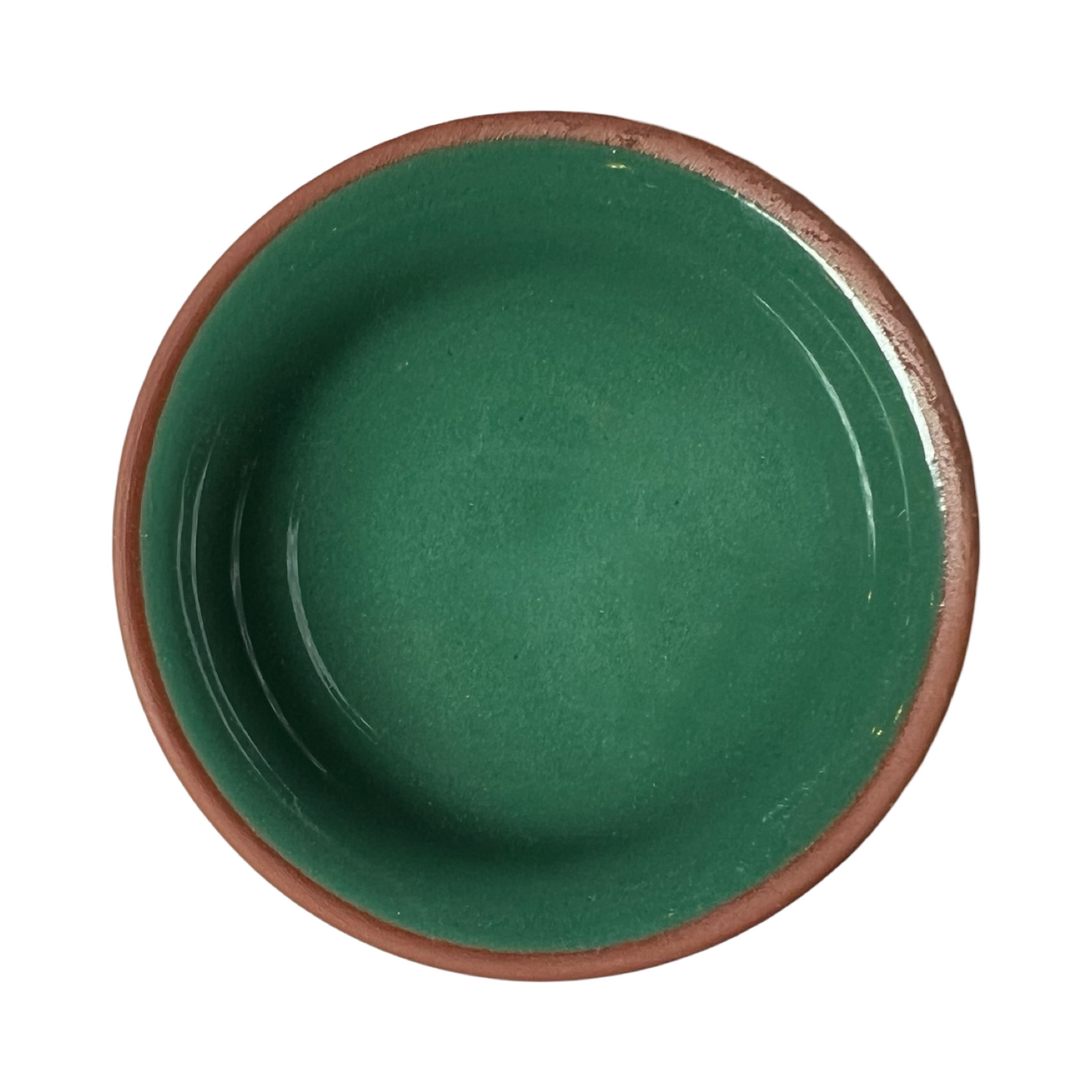 terracotta pinch bowls with an unglazed exterior and glazed interiors in green